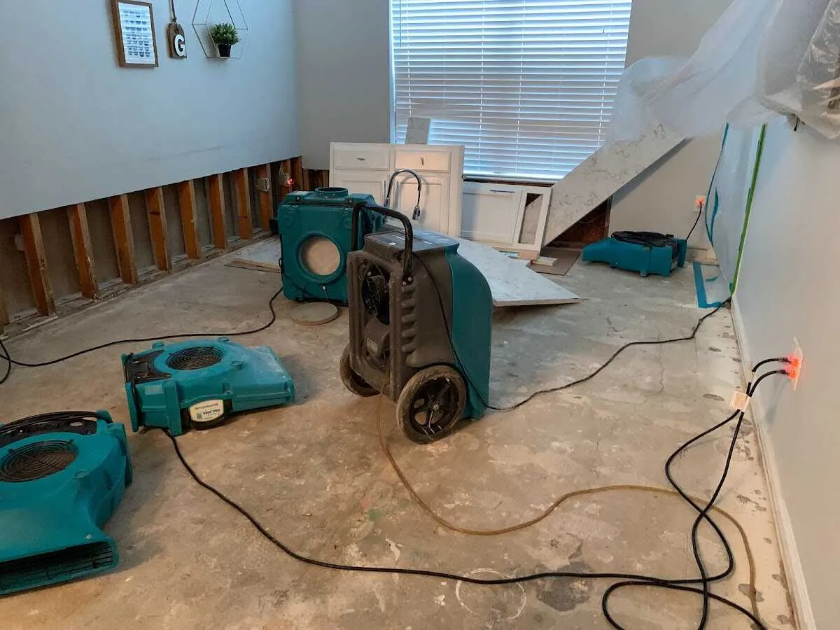 Dehumidifier in flood-cut room for Water Damage Restoration in Roseville